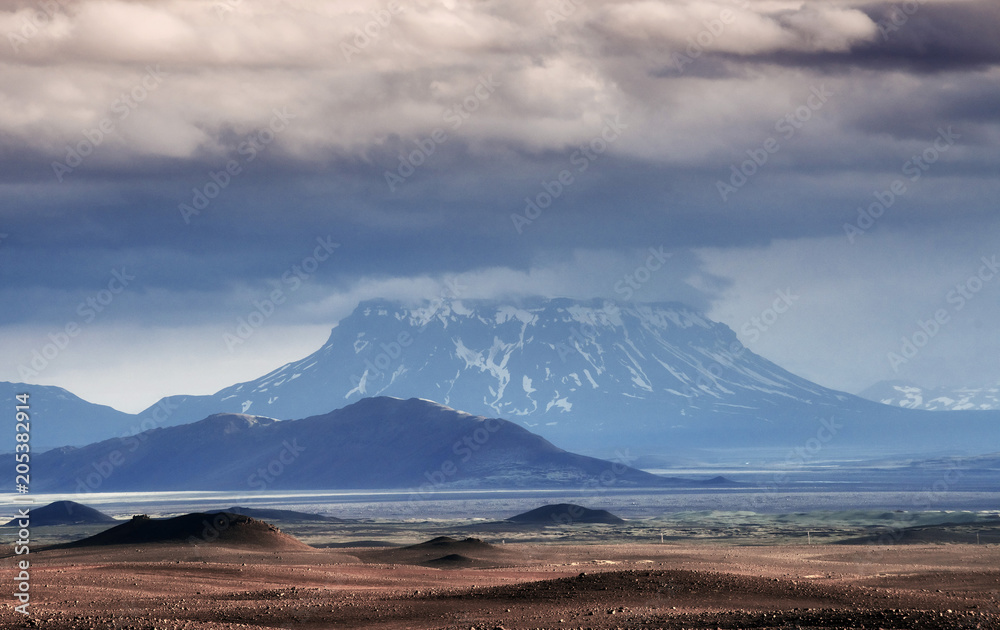 Beautiful landscape of mountain in Iceland with volcano in the background