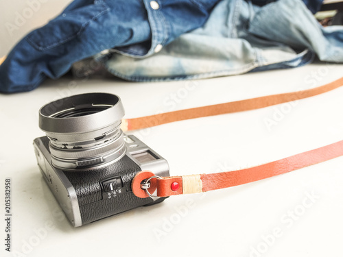 Genuine leather camera strap with mirorless camera photo