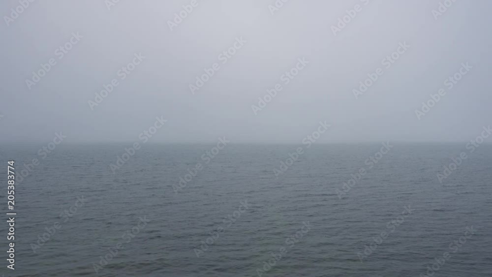 Morning calm water surface with fog, looped video. Morning calm water surface with fog, looped video.