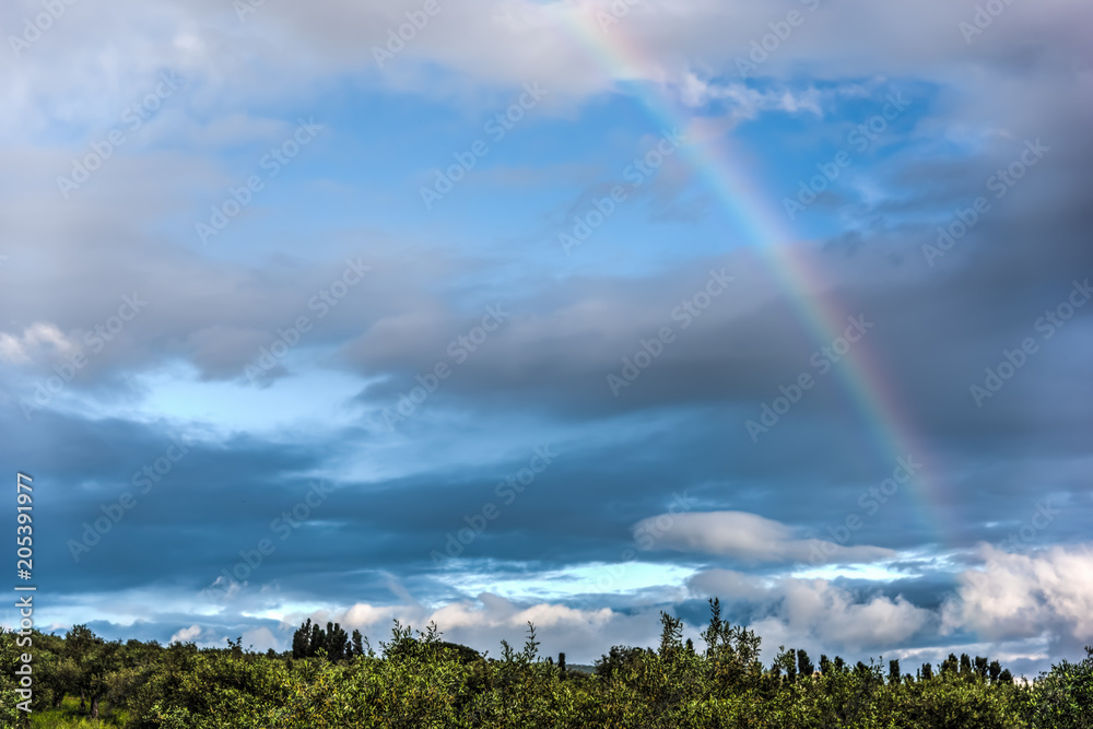 Rainbow under a cloudy sky in Sardinia Rainbow under a cloudy sky in Sardinia