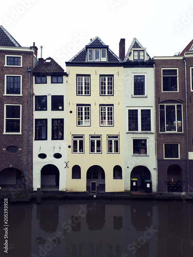 City buildings and water canal in utrecht photo