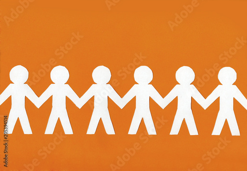 white paper men on a bright orange background.