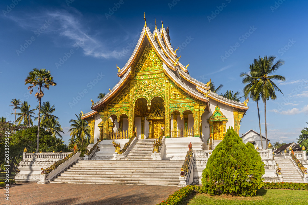 Horizontal view of The Palace chapel or Haw Pha Bang in Luang Prabang on a sunny day, Laos. Horizontal view of The Palace chapel or Haw Pha Bang in Luang Prabang on a sunny day, Laos.