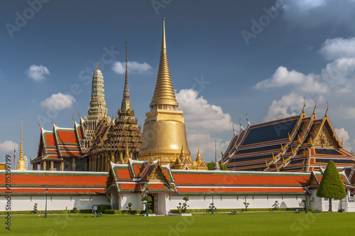 Phra Siratana Chedi gold stupa and Phra Mondop at the Wat Phra Kaeo (Kaew) Temple at the Royal Palace in Bangkok, Thailand. photo