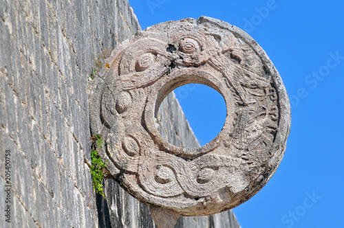 Stone ring at the great ball game court in the Chichen Itza, Mexico. photo