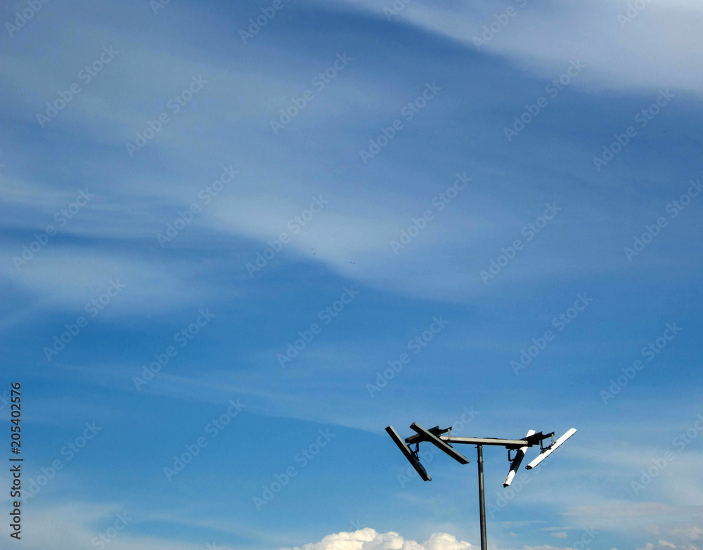 Antenna on blue sky background Antenna on blue sky background