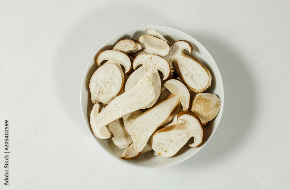 Sliced Boletus edulis ( king bolete ) on the plate Sliced Boletus edulis ( king bolete ) on the plate