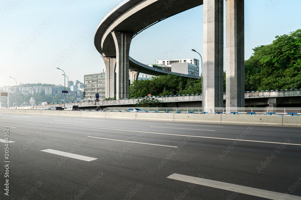 Modern urban buildings and highways in the business center