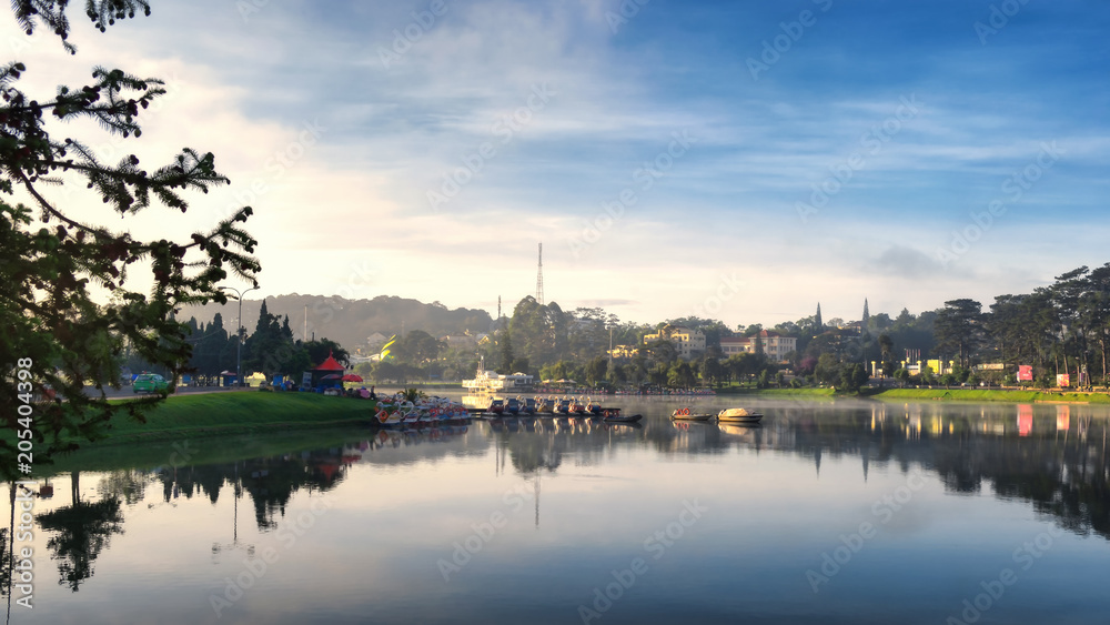 Dalat, Vietnam - May 2, 2018: View of Xuan Huong Lake in the morning. The lake is popular for sightseeing, jogging, strolling and fishing