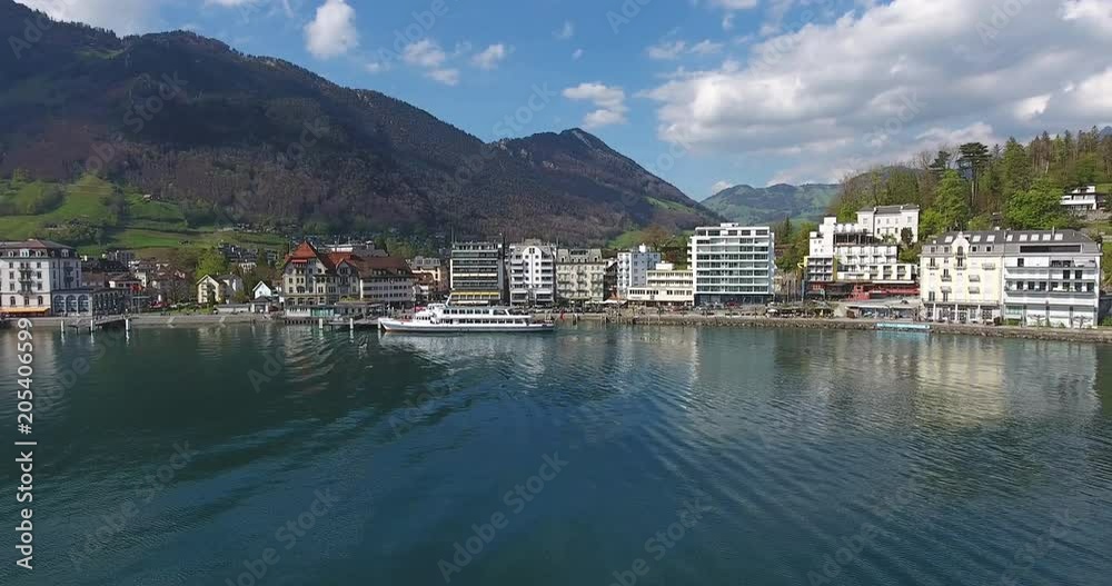 Brunnen waterfront with leaving ship Brunnen waterfront with leaving ship