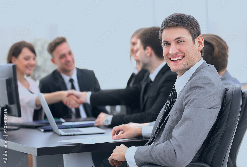 lawyer on the background of business partners handshaking lawyer on the background of business partners handshaking
