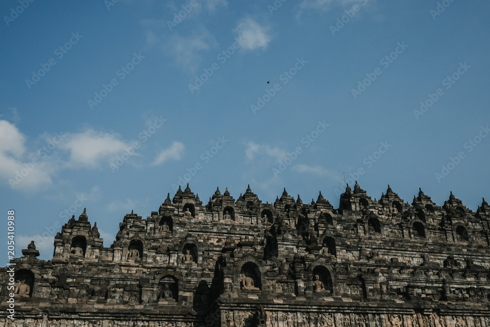 Photograph of the great Borobudur temple, historical famous place in the java island Indonesia. Lifestyle and travel photography.