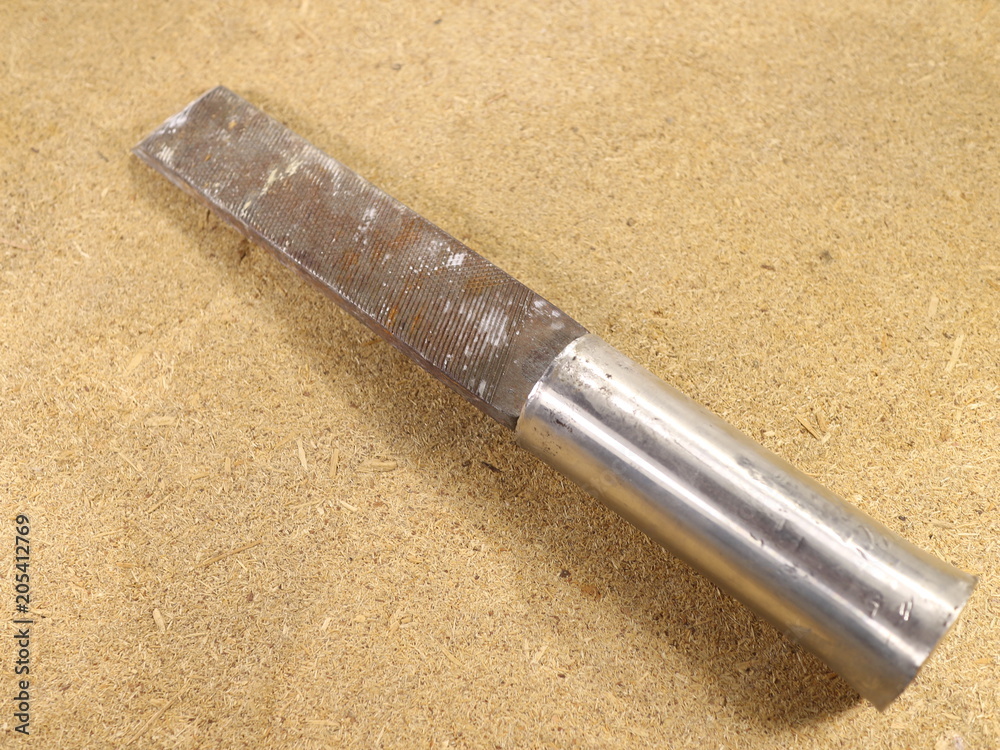 tool for work, file chisel on the board tool for work, file chisel on the board