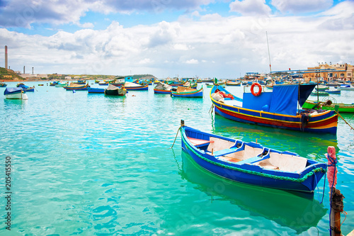 Luzzu boats in Marsaxlokk Port in bay Mediterranean sea Malta © Roman Babakin