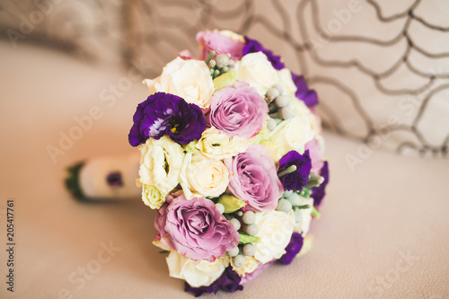 Wonderful luxury wedding bouquet of different flowers