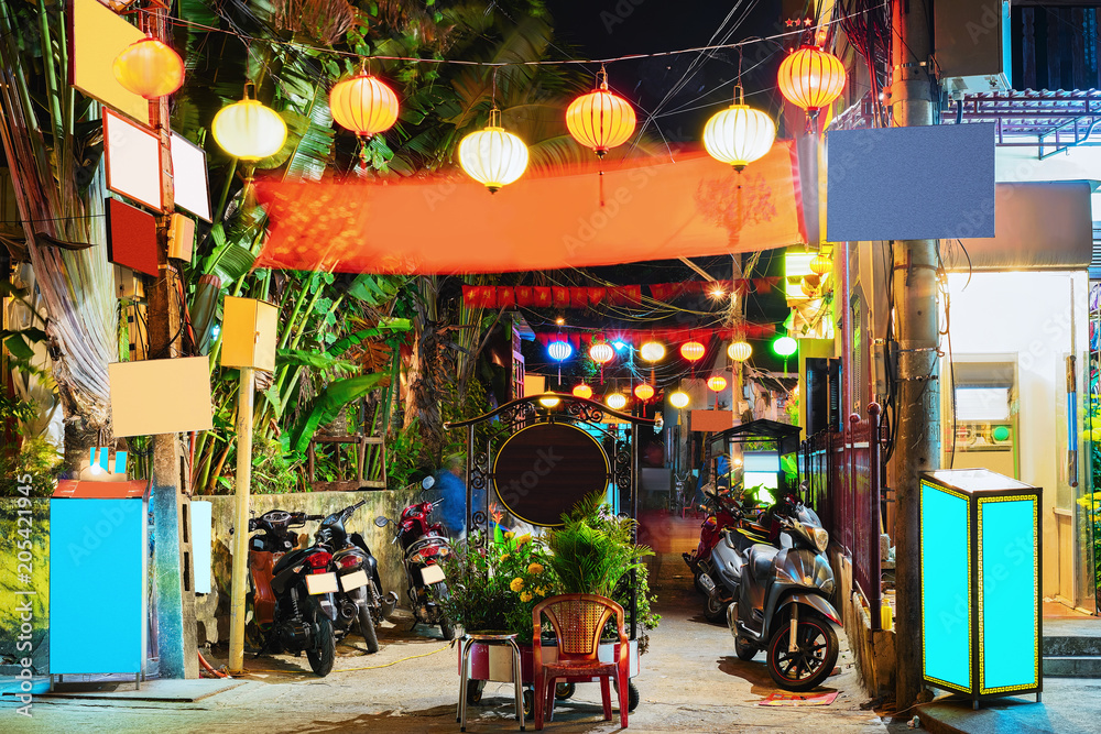 Motorcycles and street of old city of Hoi An