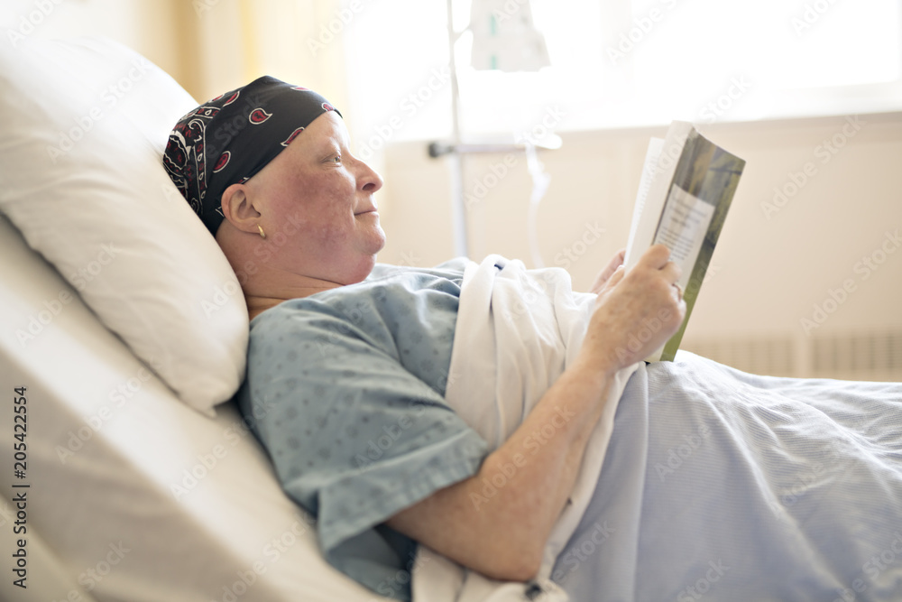 woman in hospital bed suffering from cancer woman in hospital bed suffering from cancer