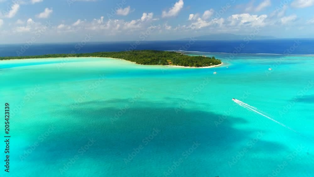 Aerial view of tropical paradise of Bora Bora island, crystal clear water of scenic turquoise blue lagoon - South Pacific Ocean, French Polynesia, 4k UHD Aerial view of tropical paradise of Bora Bora island, crystal clear water of scenic turquoise blue lagoon - South Pacific Ocean, French Polynesia, 4k UHD