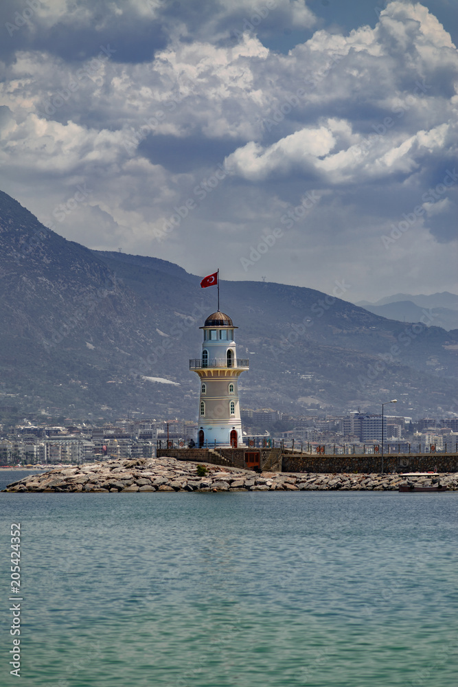 Lighthouse against the turquoise sea