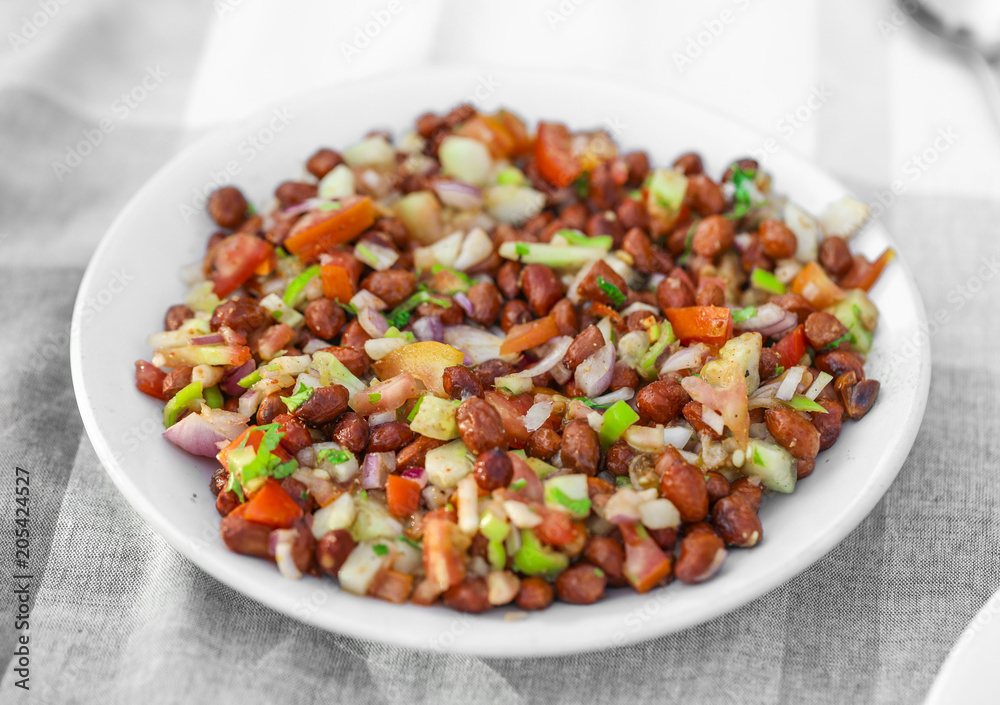 Homemade Spicy Vegetarian Gram Salad Also Know As Chana Salad or Chana Masala With Cutted Vegetables Homemade Spicy Vegetarian Gram Salad Also Know As Chana Salad or Chana Masala With Cutted Vegetables