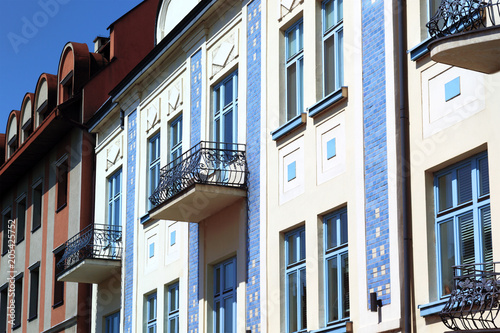 A row of renovated old tenements on the market