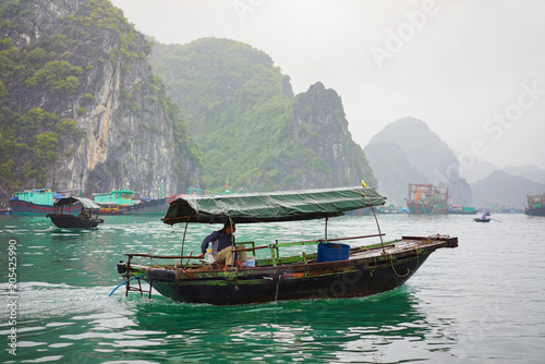 Fishing boat in Ha Long Bay Vietnam Asia © Roman Babakin