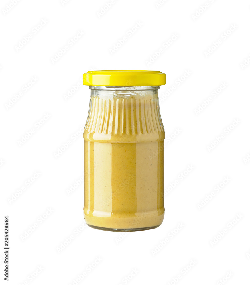 jar with mustard on white background jar with mustard on white background