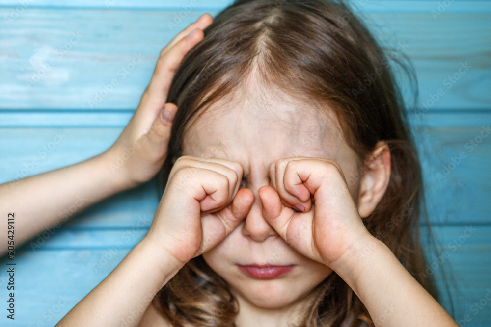 Fototapeta premium The girl calms her crying friend. Children's friendship, support