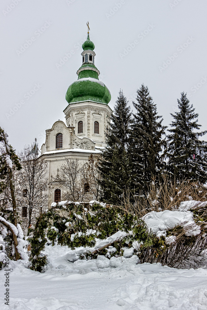 Fototapeta premium lonely church is very snowy in winter