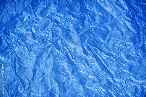 Wrinkled texture of blue plastic