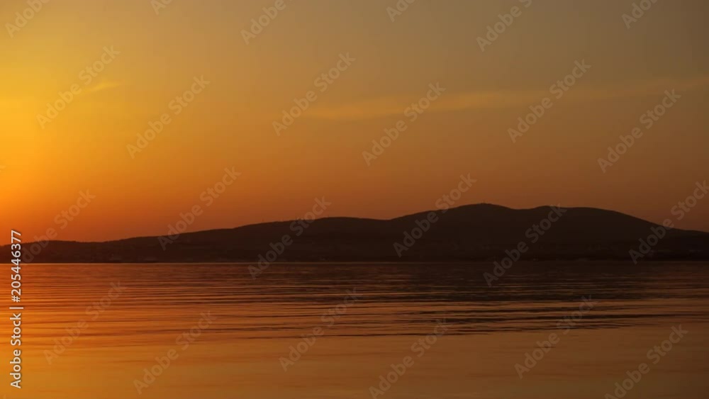 Beautiful sunset over mountains lake, calm water. Beautiful sunset over mountains lake, calm water.