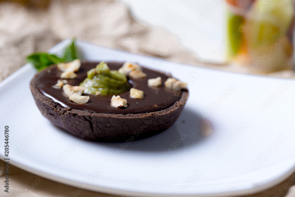 chocolate tart with pistachio and and hazelnut