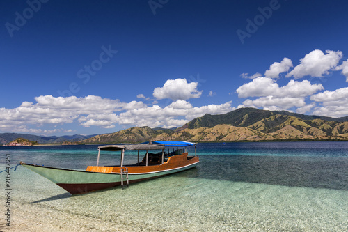 A tradtional Indonesian boat in the Seventeen Island National Park, Indonesia.