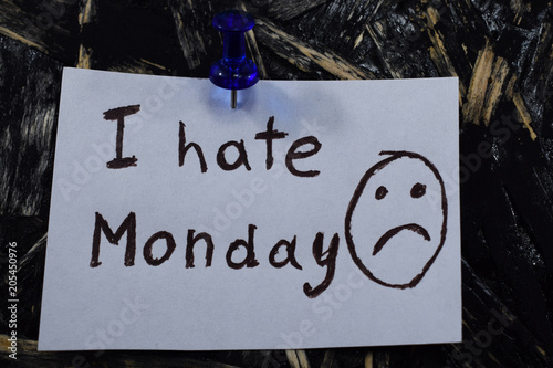 inscription I hate Monday on a white sheet of paper