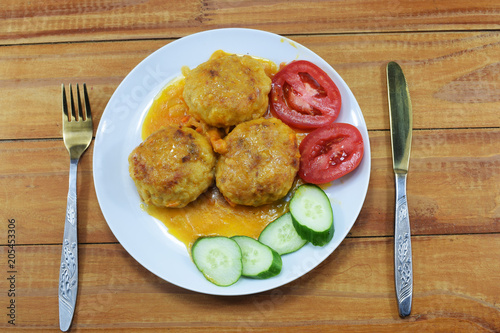 lunch, sauce with meat cutlets and with fresh tomatoes and cucumbers