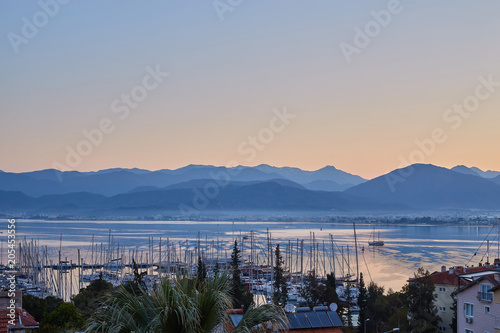 Beautiful bay and port of Fethiye during sunset photo