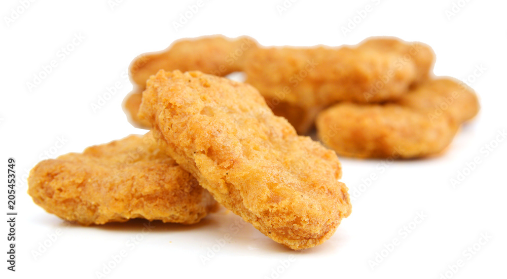 heap of chicken nuggets isolated on white background