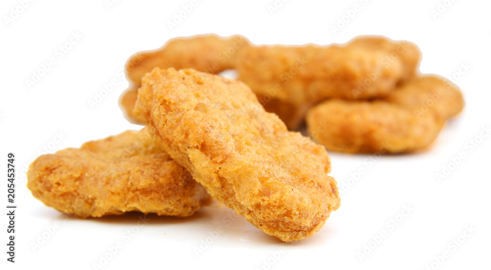 heap of chicken nuggets isolated on white background heap of chicken nuggets isolated on white background