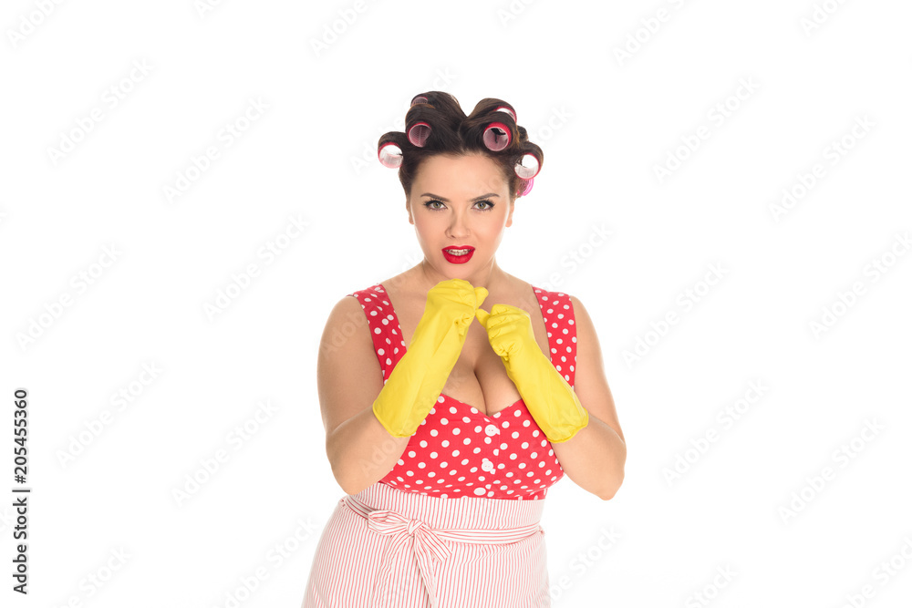 angry plus size housewife in rubber gloves standing in fight pose isolated on white angry plus size housewife in rubber gloves standing in fight pose isolated on white