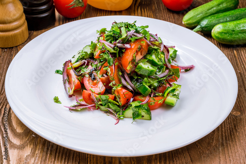 Vegetable salad with tomatoes and cucumbers