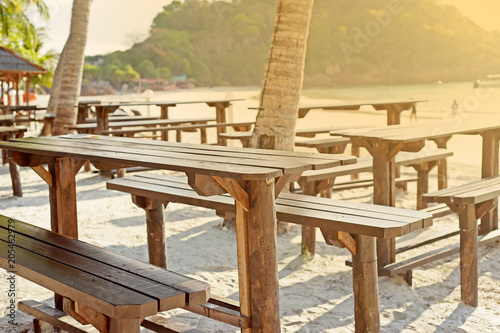 Table at beach with evening sunset lighting