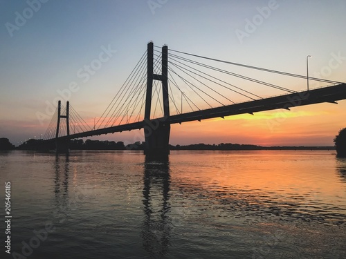 Quincy Illinois Memorial Suspension Bridge at Sunset over Mississippi River photo