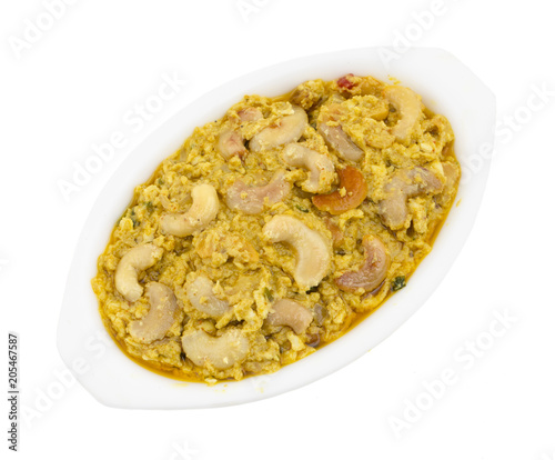 Indian Traditional Vegetarian Cuisine Kaju Curry Also Called Kaju Butter Masala isolated on White Background
