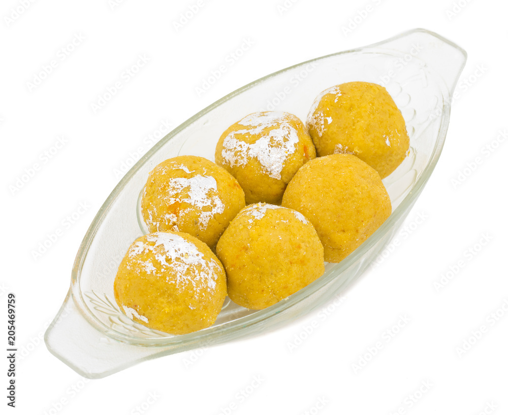 Besan Laddu Indian Traditional Sweet Food Also Know as Laddoos, laddoo, ladoo, laddo Are Ball-Shaped Sweets Popular in The Indian Festivals. isolated on White Background Besan Laddu Indian Traditional Sweet Food Also Know as Laddoos, laddoo, ladoo, laddo Are Ball-Shaped Sweets Popular in The Indian Festivals. isolated on White Background