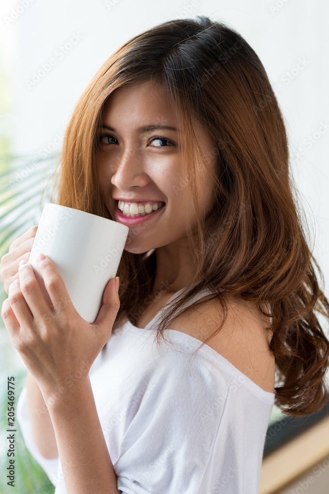 Attractive Woman Enjoying Fragrant Coffee Attractive Woman Enjoying Fragrant Coffee