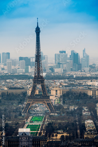 Aerial cityscape of Paris, France, with the Eiffel tower seen from the Tour Montparnasse © EwaStudio