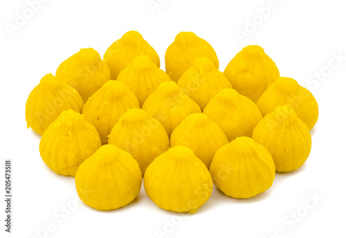 Indian Sweet Food Modak Also Know as Laddu, Khoya, khova Modak, Kozhakkatta, Modhaka, Kadubu, Modhakam, Kozhakkattai, Kudumu. Made up of Coconut And Jaggery, Rice Flour, Wheat with Khava photo