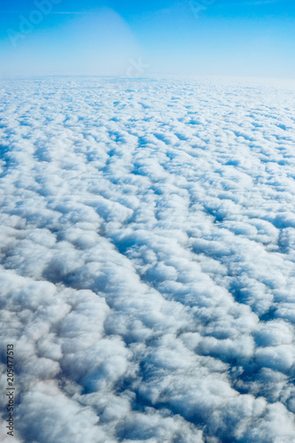 clouds from airplane window. View of the sky above the clouds