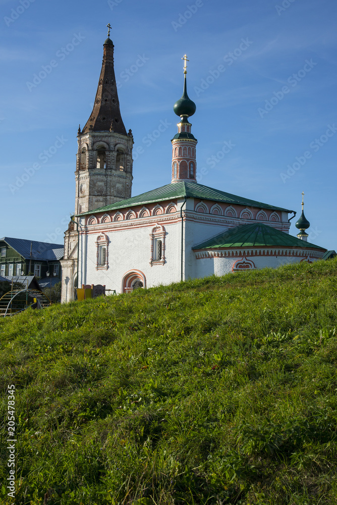 Bell tower and orthodox church in the Suzdal, Russia