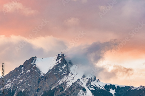 Fire in the sky over the mountain peak © jeffrey van daele